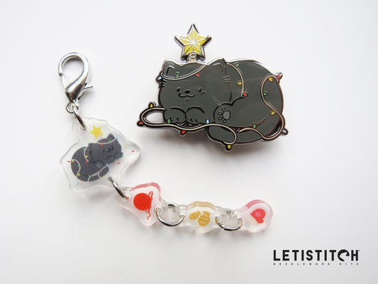Cat-themed keychain and needleminder with 'Letistitch' branding on a white background