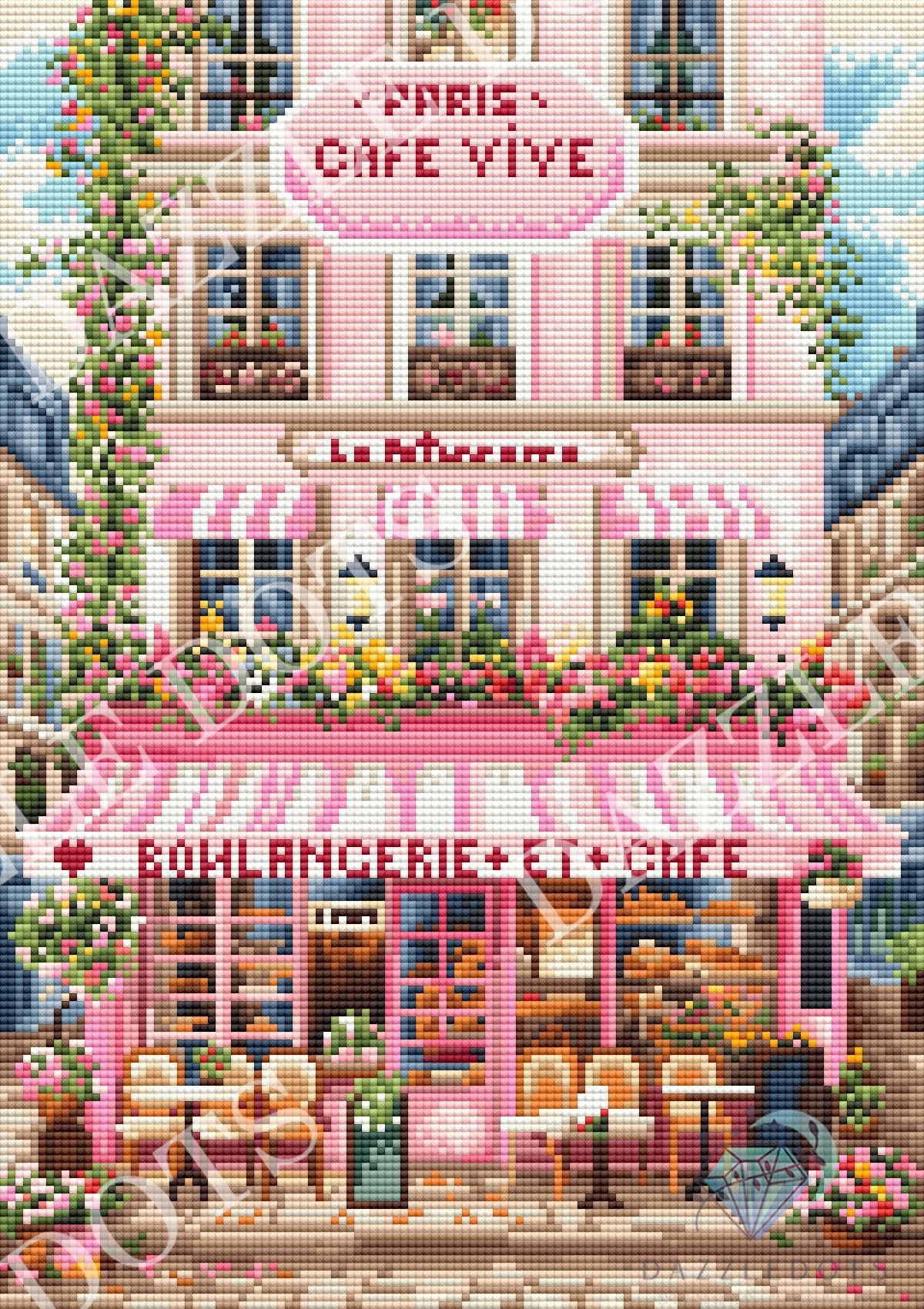A diamond painting design depicting a pink Parisian cafe building with flowers, outdoor seating, and French signage including 'PARIS CAFE VIVE'.