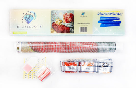 Dazzledots product packaging with diamond painting supplies on a white background