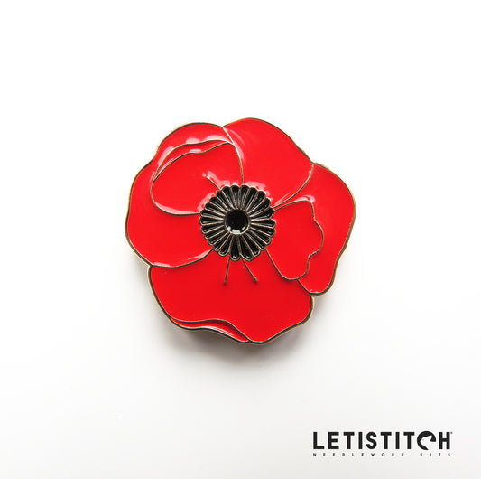 Red poppy flower needleminder with black center on a white background, featuring the brand 'Letistitch'.