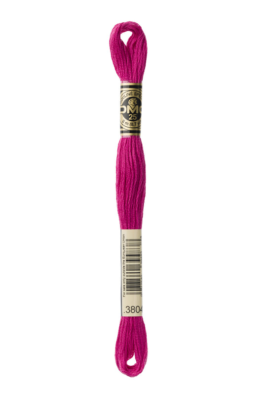 Pink embroidery floss spool with a brand label on a white background