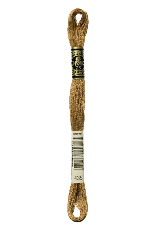 Brown embroidery floss spool with a label on a white background