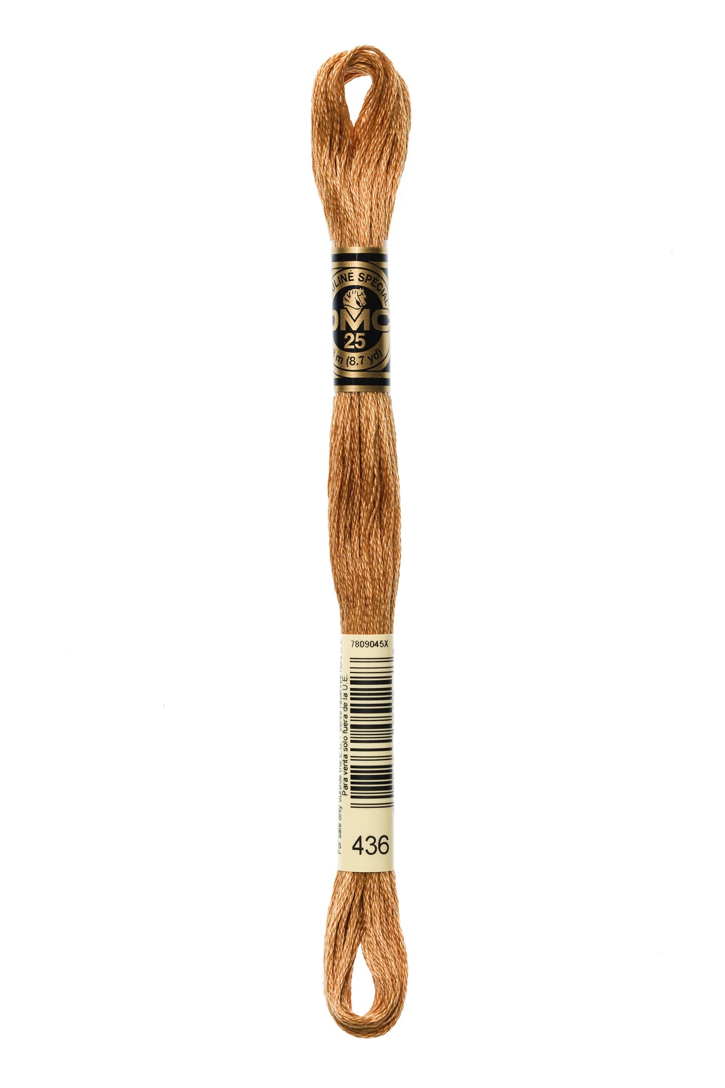 Brown embroidery floss spool with label on a white background