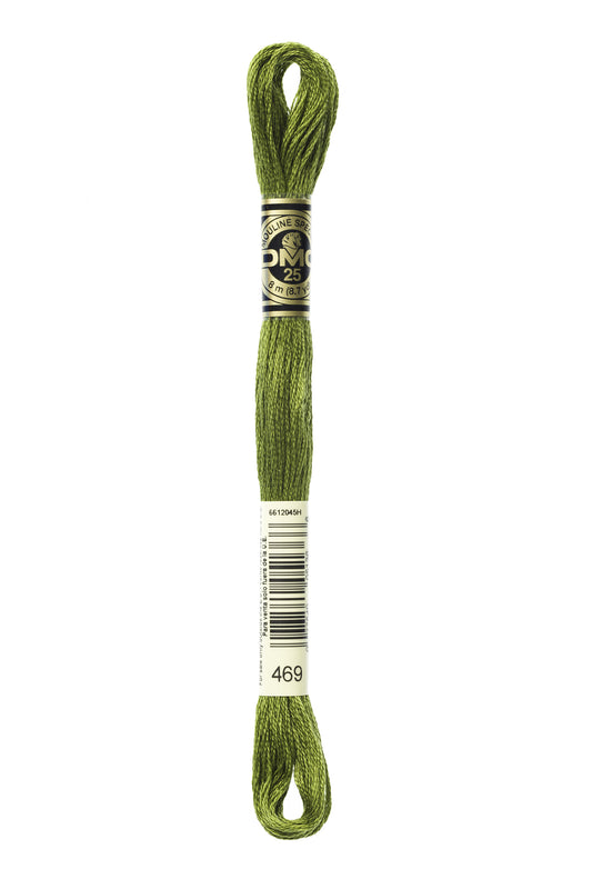 Green embroidery floss spool with a brand label on a white background