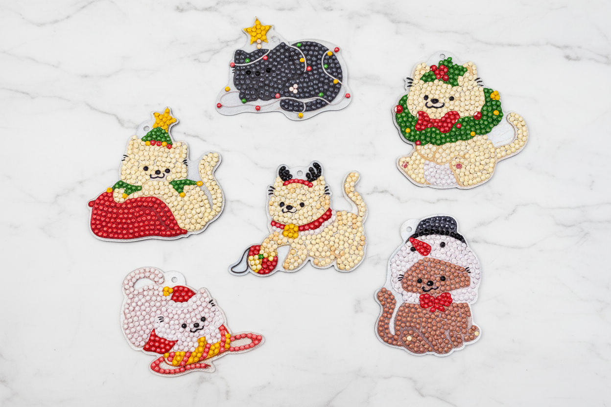 Set of decorative animal figurines with Christmas-themed accessories on a white background