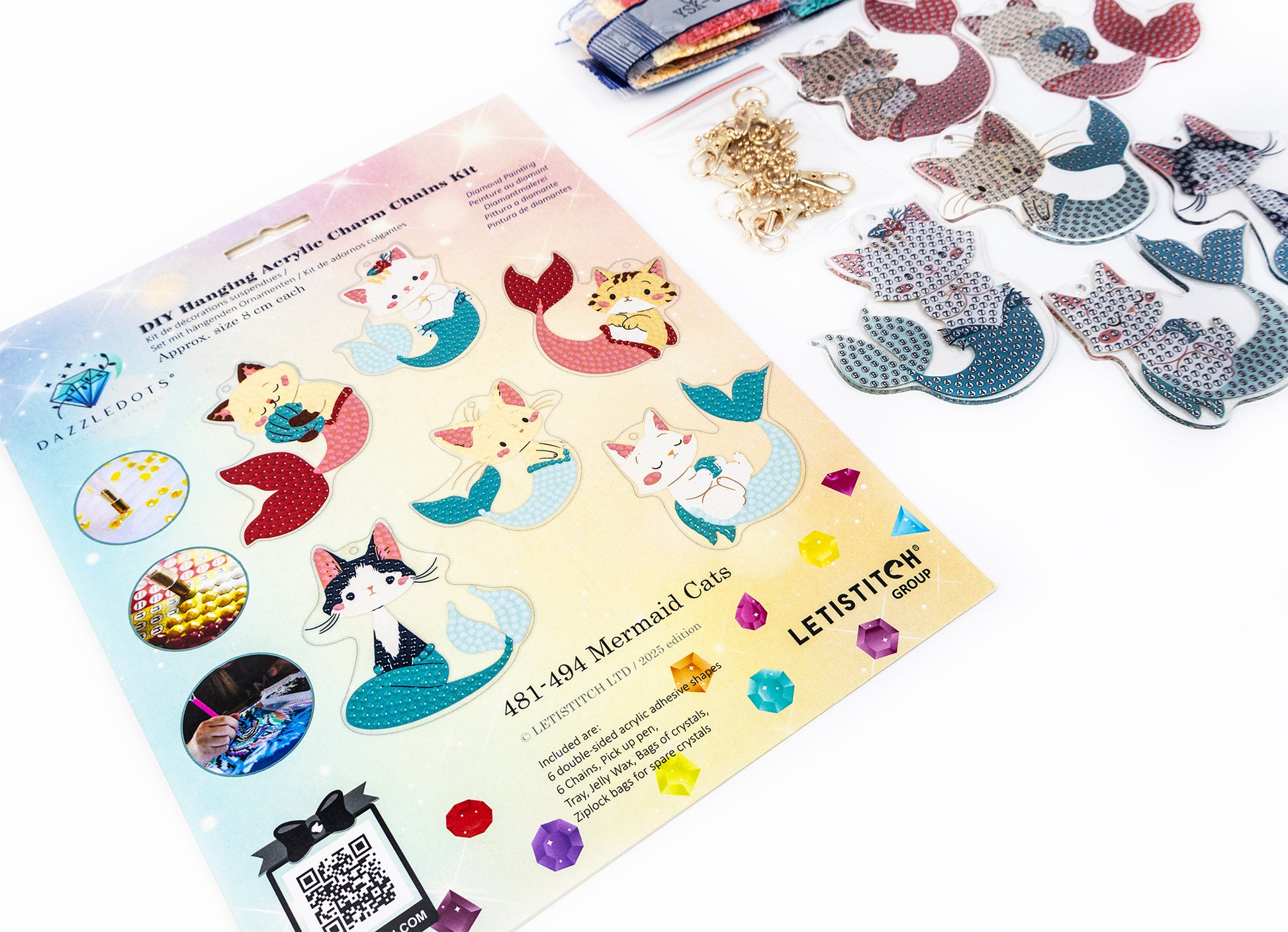 Mermaid-themed acrylic charm crafting kit with instructions and materials on a white background