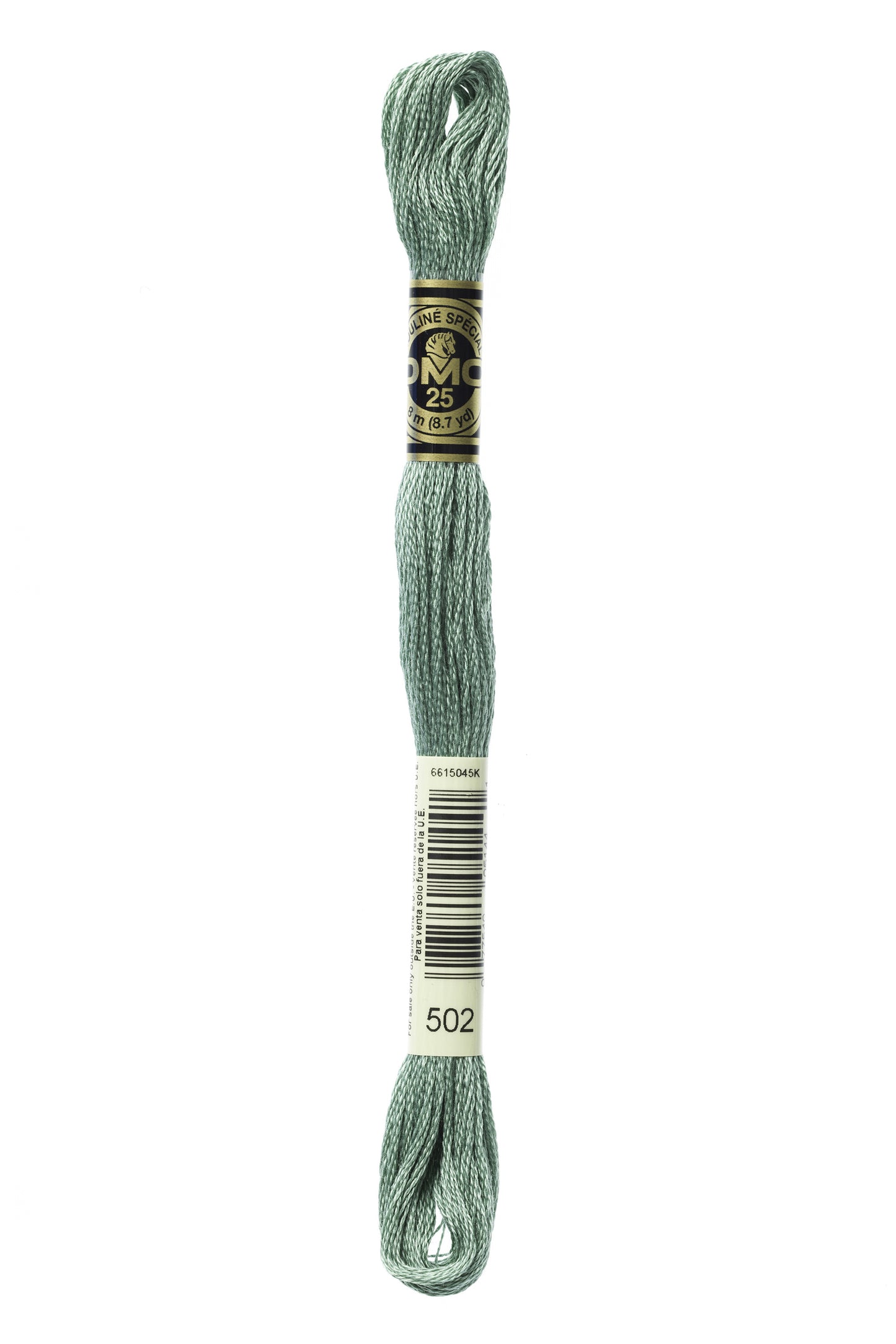 Green embroidery floss on a white background