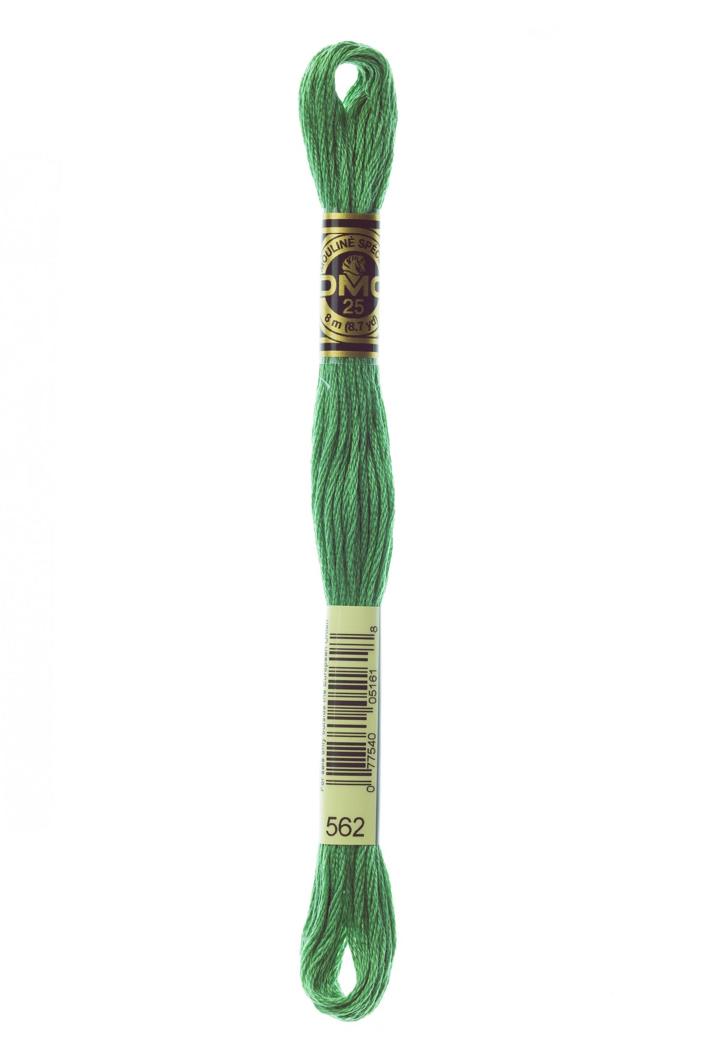 Green embroidery floss spool with a label on a white background