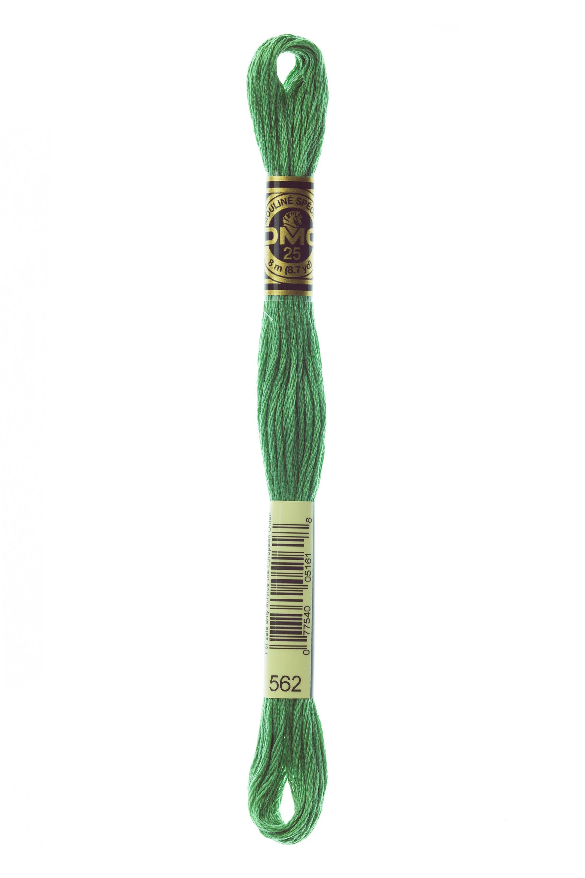 Green embroidery floss spool with a label on a white background
