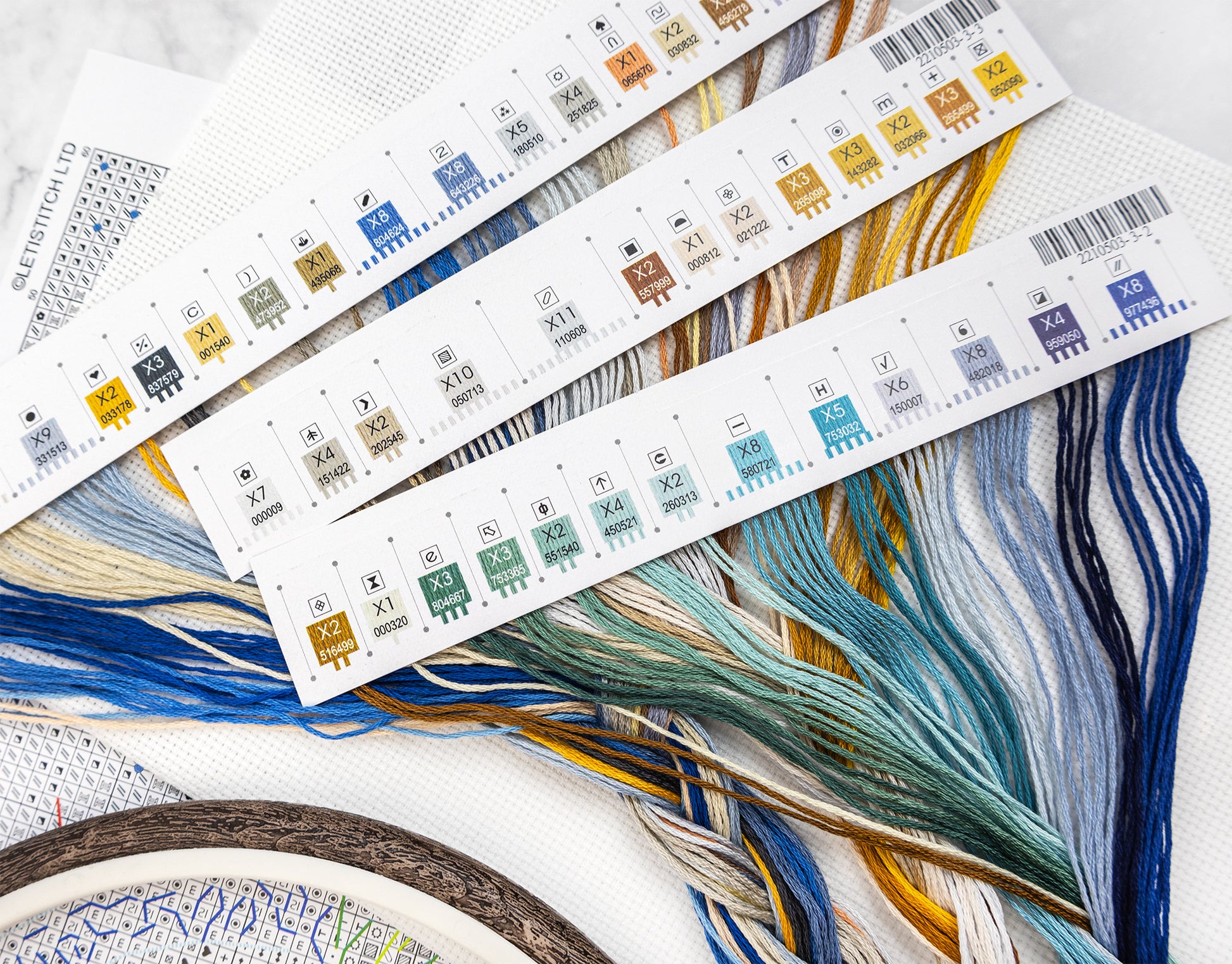 Color swatches with embroidery threads on a white background