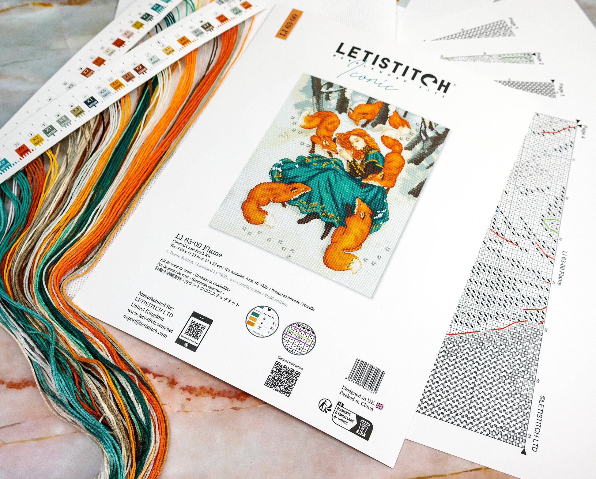 Letistitch embroidery kit with colorful threads on a marble surface