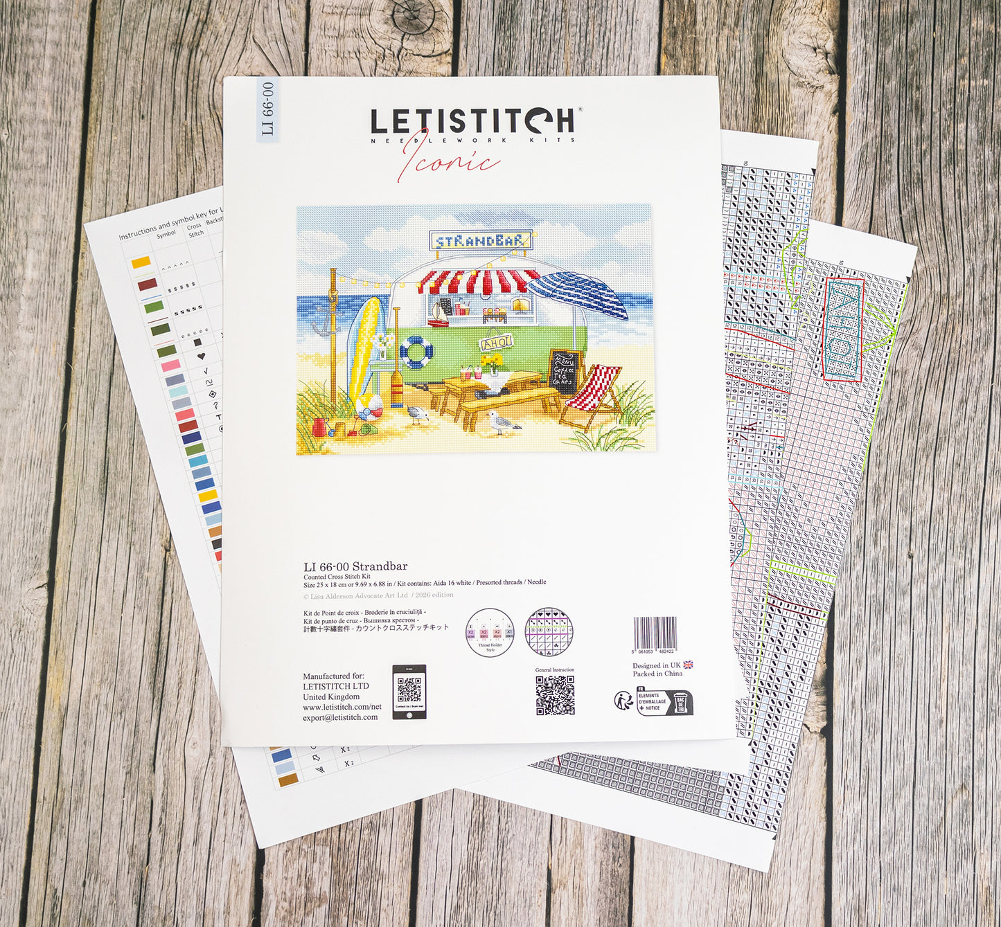 Letistitch embroidery design sheet on a wooden surface