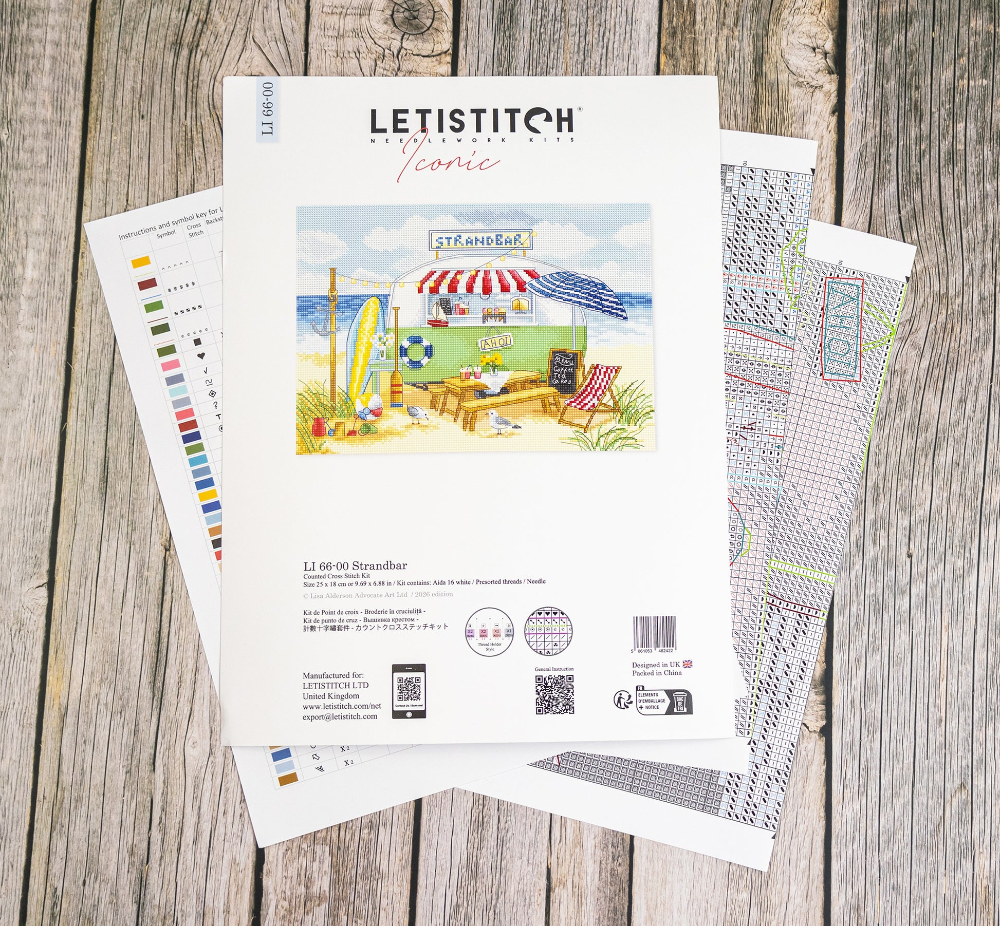 Letistitch embroidery design sheet on a wooden surface