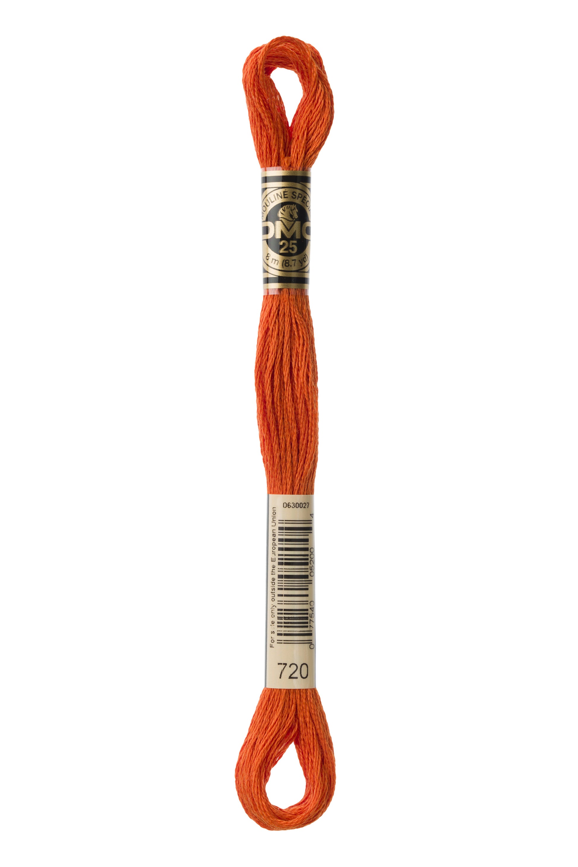 Orange embroidery floss spool with a label on a white background