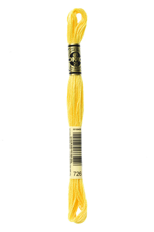 Yellow embroidery floss spool with a label on a white background