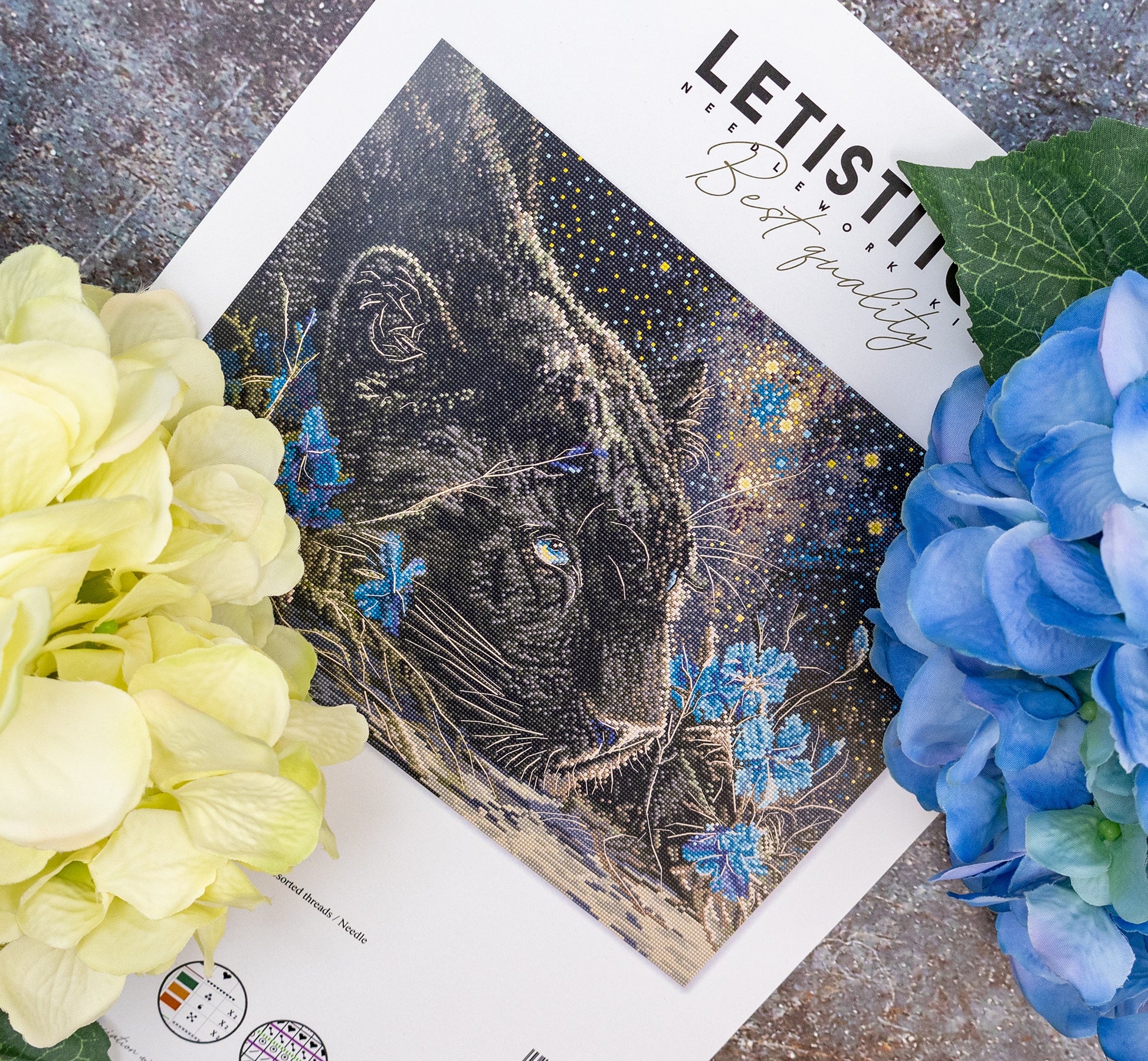 Decorative card with a panther design on a magazine with flowers around