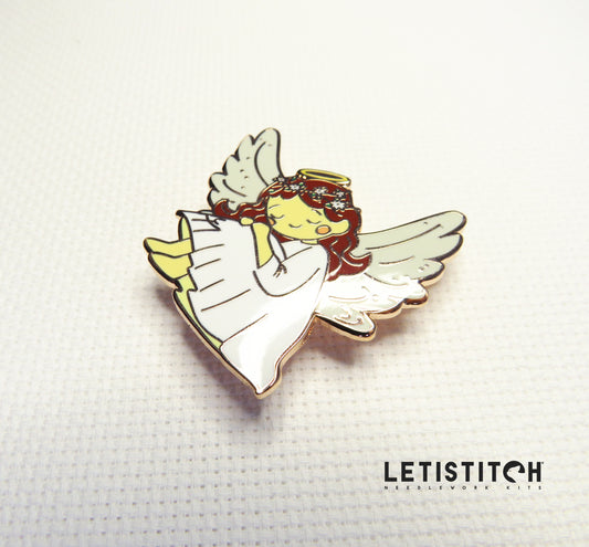 Angel-shaped needleminder with wings on a textured white background, featuring the brand 'Letistitch'.