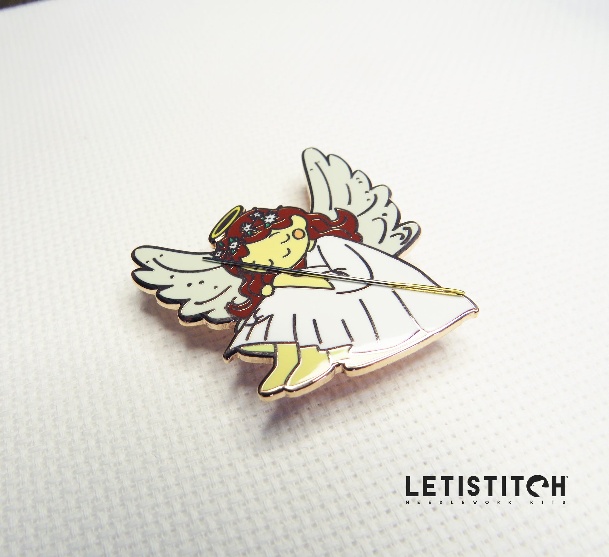 Angel-shaped needleminder on a white background with 'LETIStitch' branding.