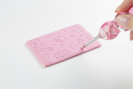 Pink putty on a white background