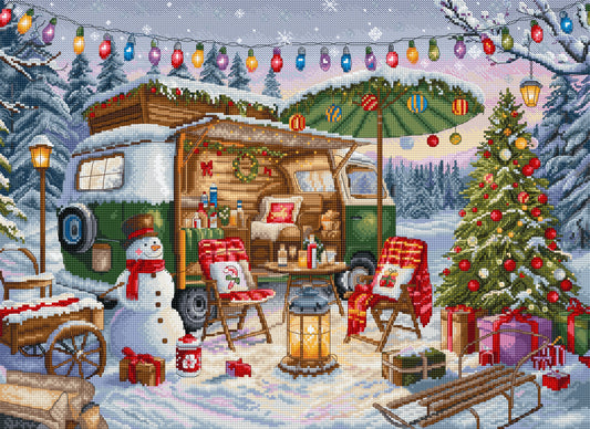 Decorative cross-stitch pattern of a winter scene with a camper, Christmas tree, and snowman.