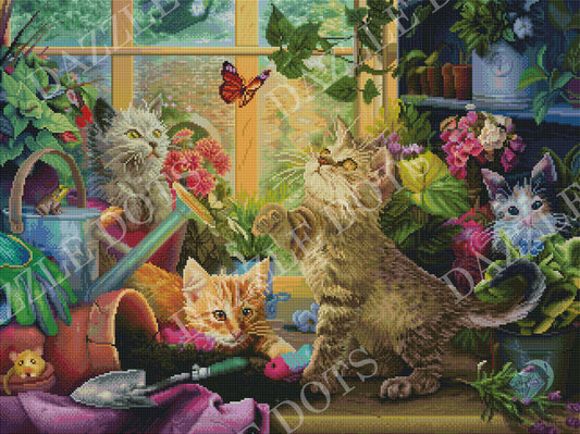 Diamond art club kit of kittens playing with flowers and a butterfly in a garden setting.