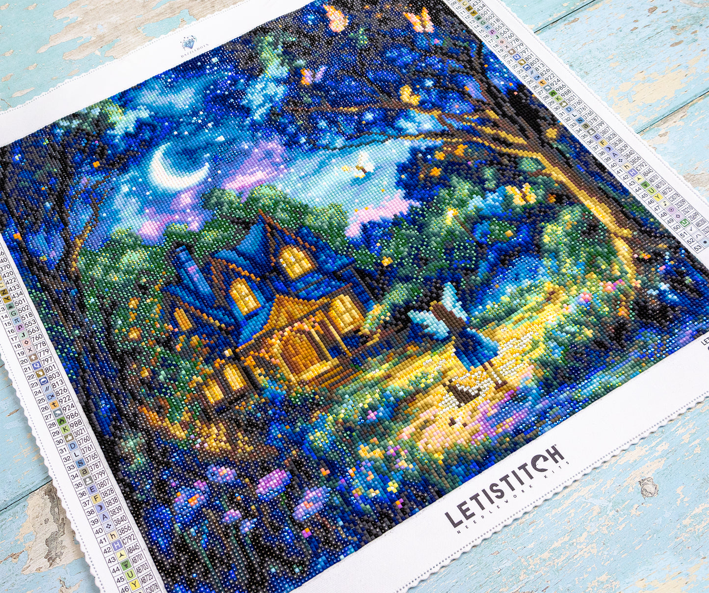 Diamond art scene with a house and moonlit sky, featuring the brand 'LETIStitch'.