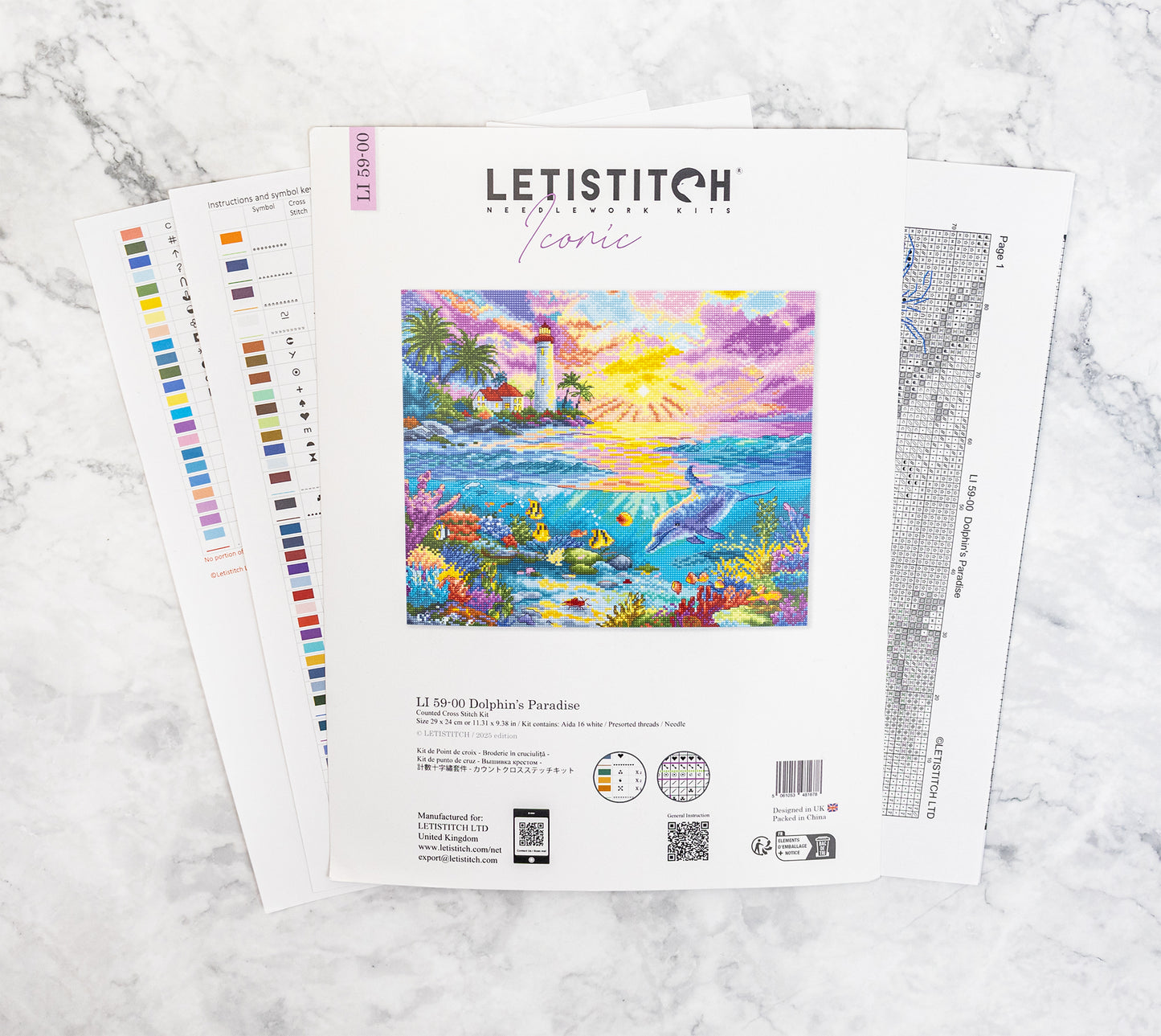 Letistitch embroidery kit with a colorful design of a lighthouse and ocean on a marble surface
