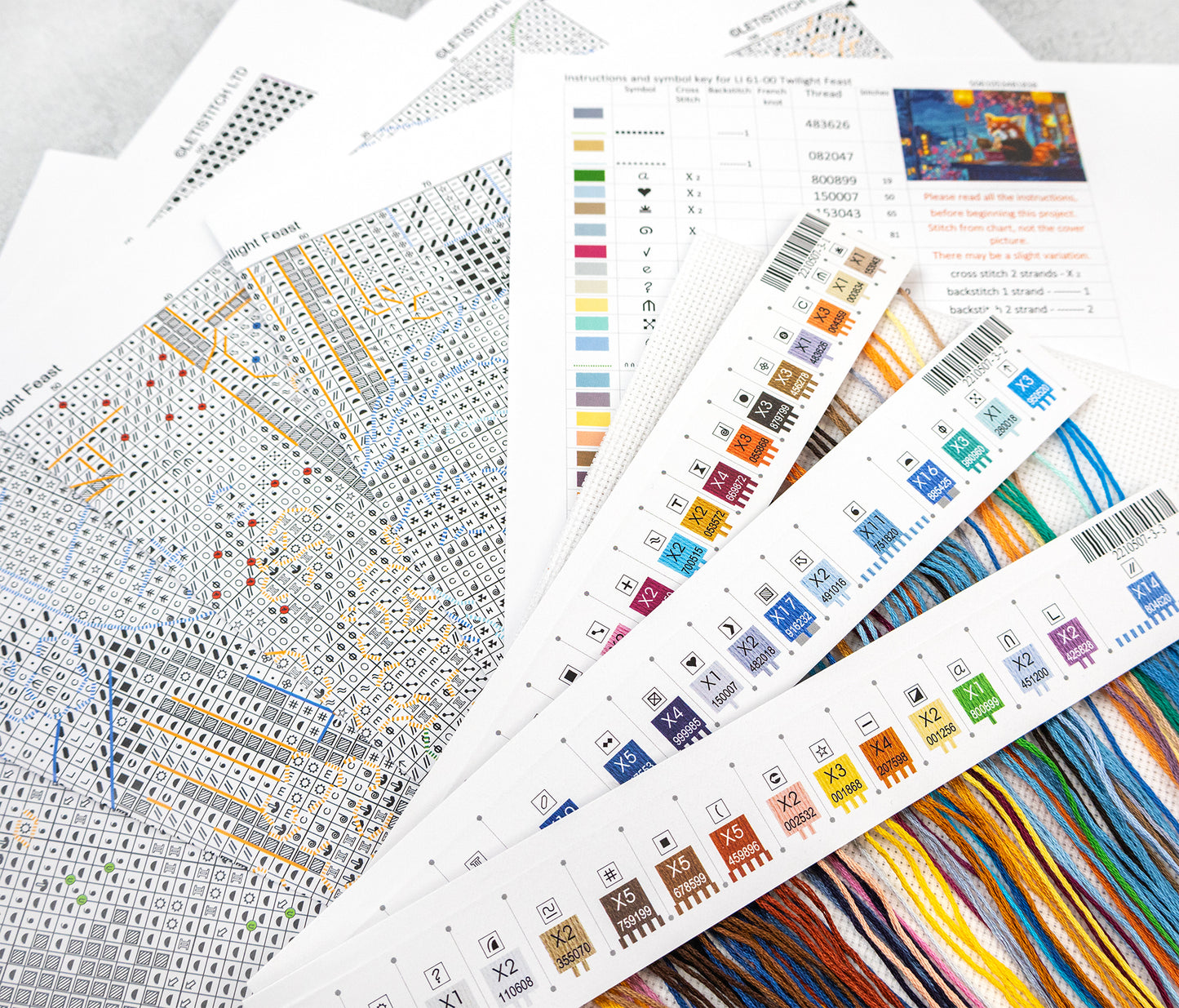 Collection of patterned paper sheets with colorful designs on a white background