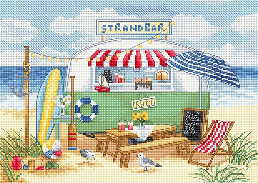 Beachside Strand Bar scene with a colorful umbrella and deck chairs.