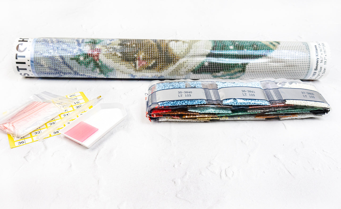 Folded diamond art club canvas with visible text and images on a white background