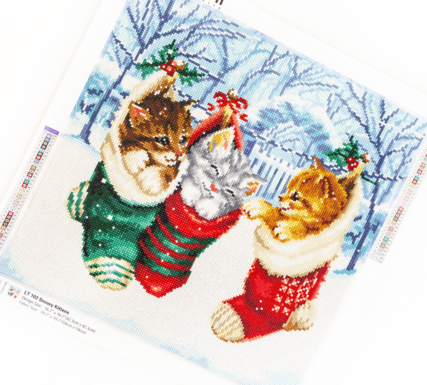 diamond art club  design of three cats in Christmas stockings with a snowy background