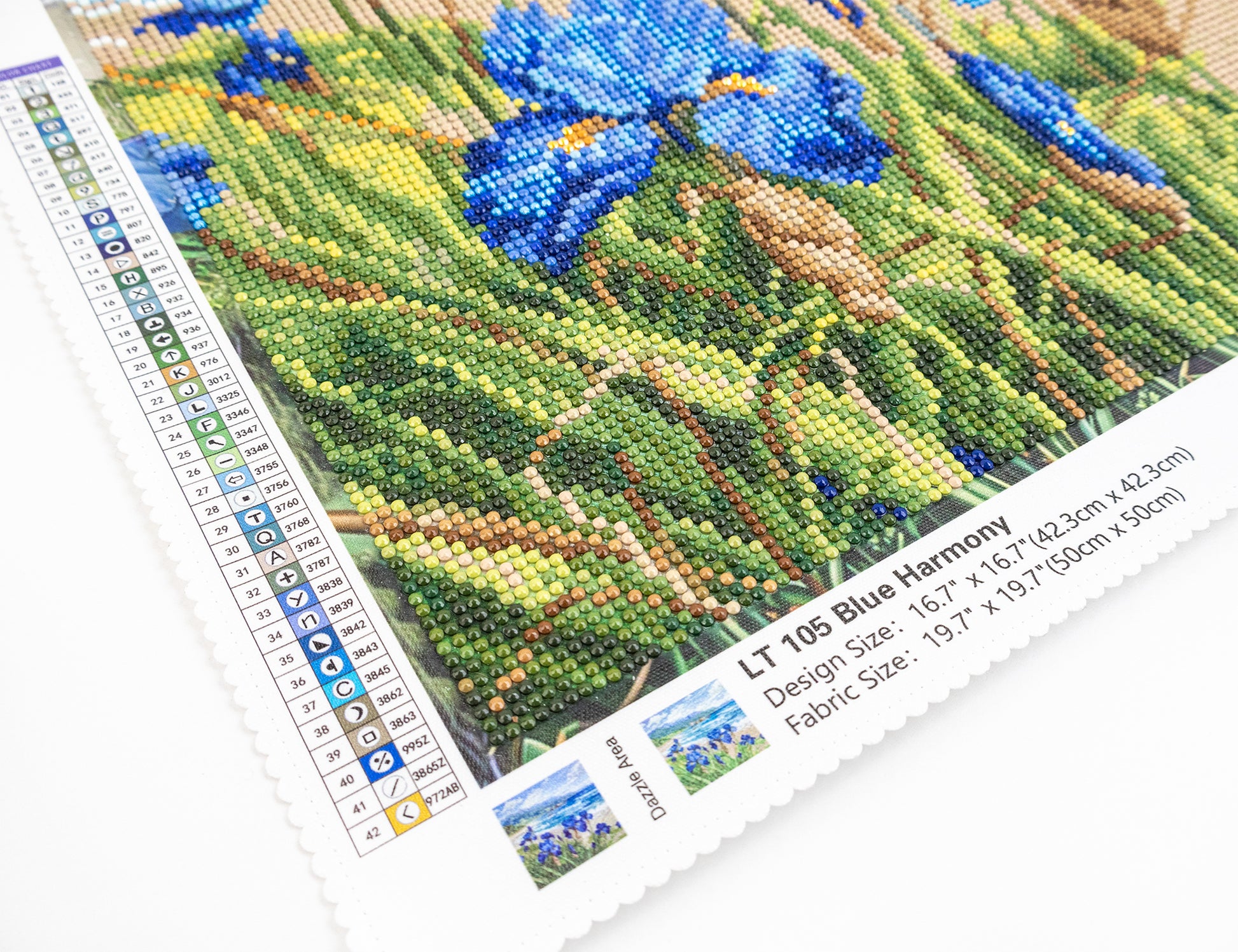 Diamond painting kit with blue flowers and measurement guide