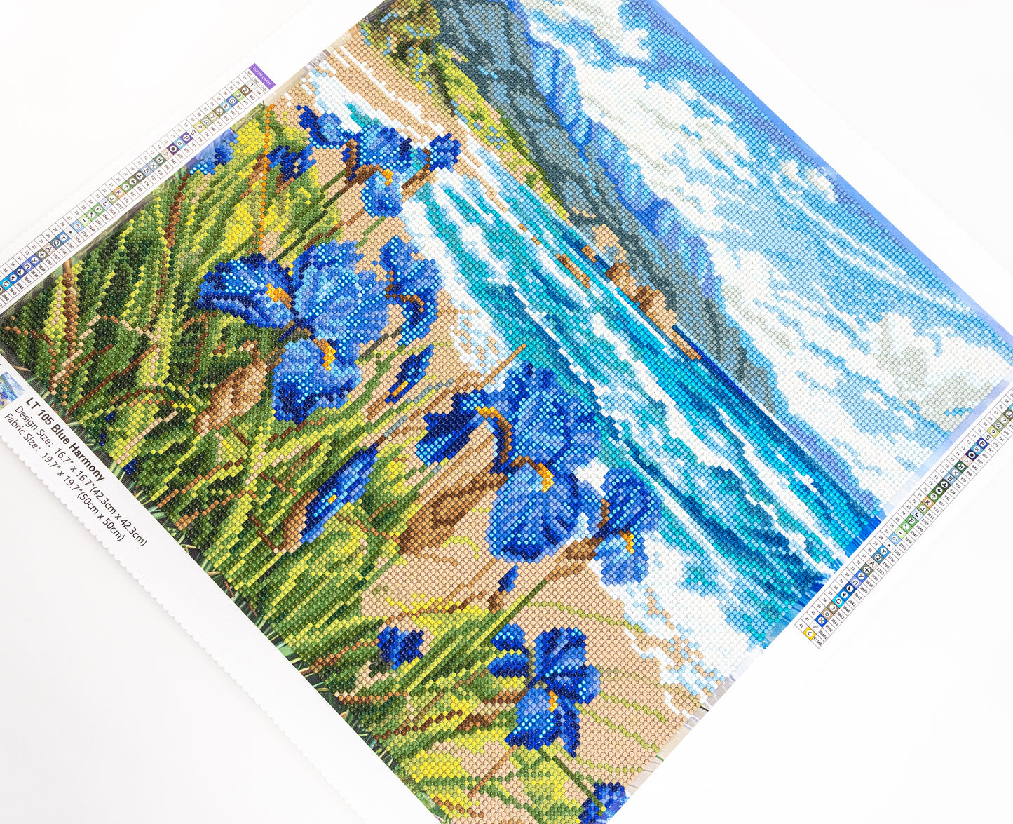 Diamond Art with blue flowers and a landscape
