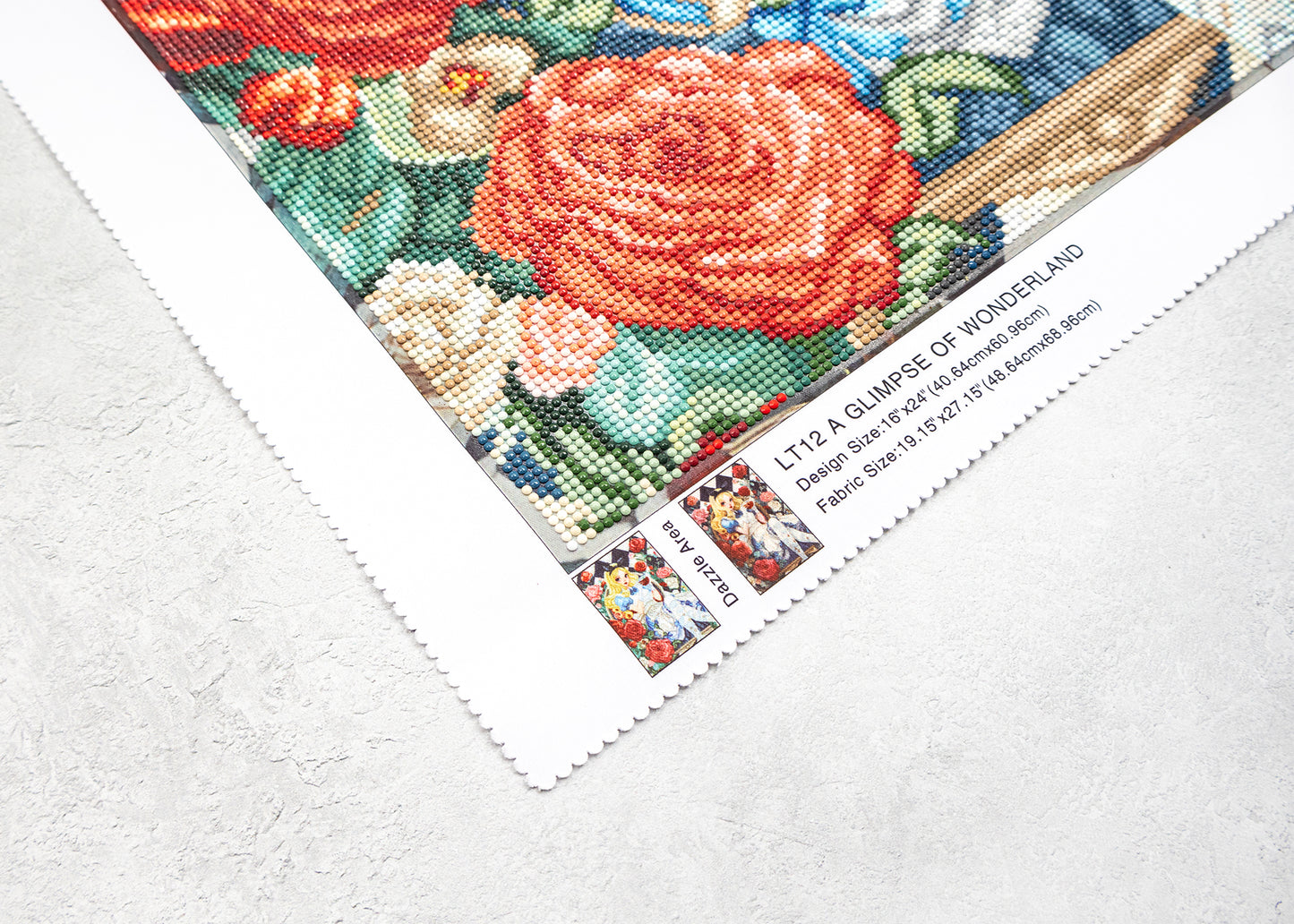 crystal art pattern with floral design on a white fabric background