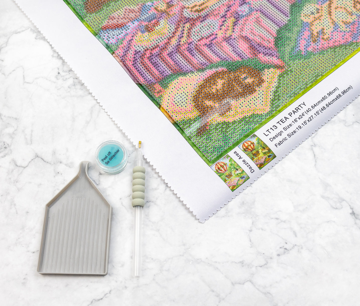 Diamond Painting kit on a white marble surface