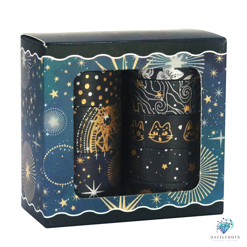 Set of black tape with celestial designs in a decorative box