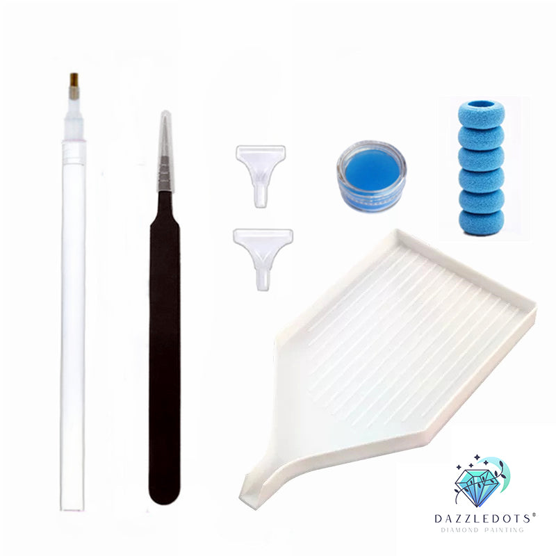 Collection of diamond art tools with Dazzledots logo on a white background